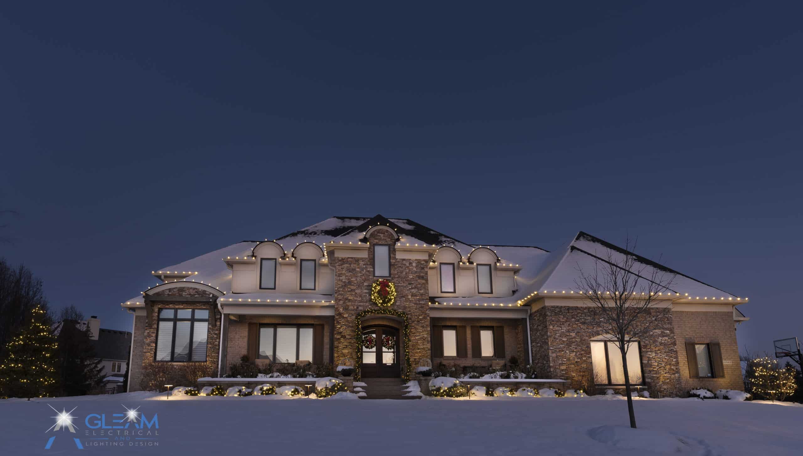 Christmas lights photo - residential outdoor lighting Celebrate Christmas in July with Gleam’s custom Holiday Lighting services! We design, install, take down, and store your lights—stress-free and stunning from start to finish.