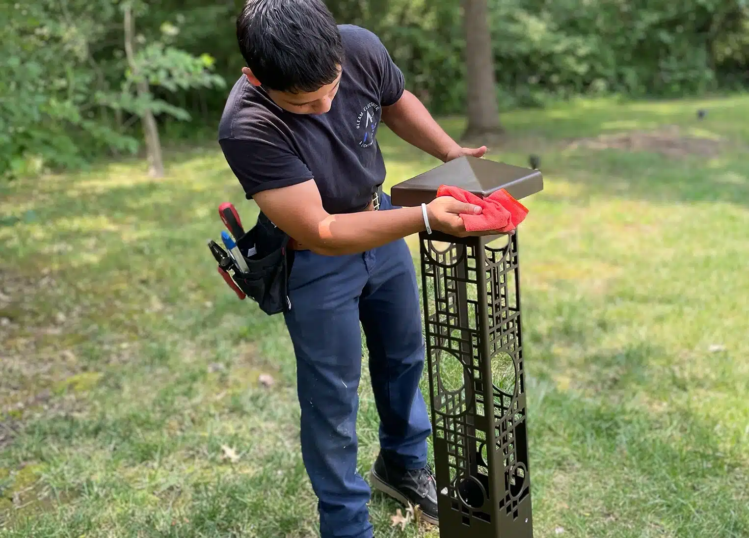 Gleam worker installing outdoor lighting